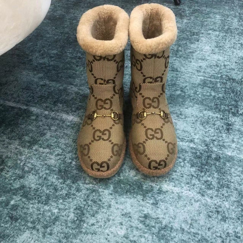G*u*i boots